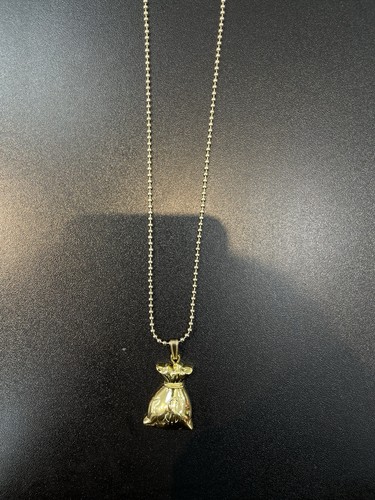 Gold tone money bag pendant - gold,