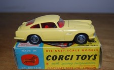 Corgi 218 Aston Martin DB 4. Primrose yellow.  Excellent Condition original box.