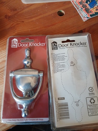 Door knocker with - door, fixings