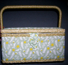 SEWING BASKET WITH SOME CONTENTS - 10" x 8" x 5" - GREEN/WHITE/YELLOW PRINT