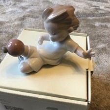 NAO By Lladro 02001550 Star Striker Boy With Football Figurine