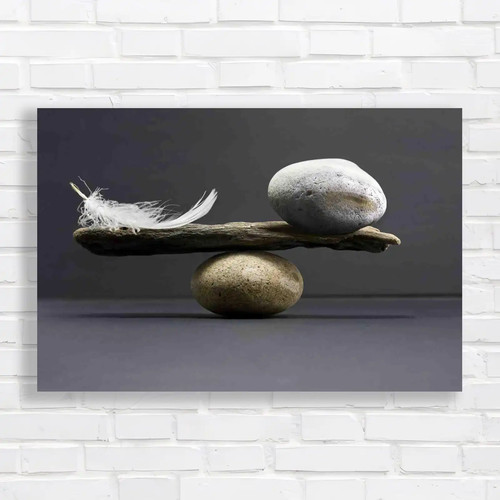 Balancing pebble and - pebble, feather