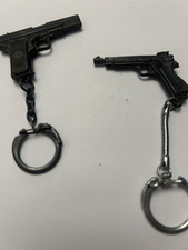 2 key ring miniature guns