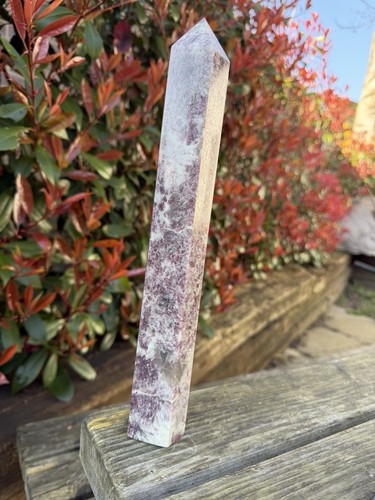 Pink tourmaline tower over - pink,