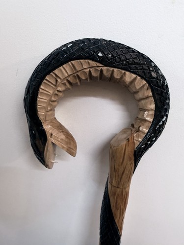 Hand carved walking - hand,