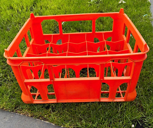 Orange plastic milk bottle - plastic,