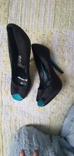 Queen of the Catwalk Aqua Heels size 6