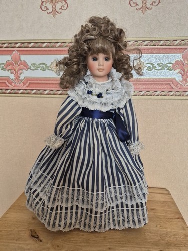 Vintage porcelain doll in - porcelain,