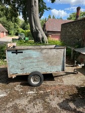 Drop tail high sided 2 wheeled trailer