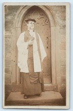 POSTCARD UNIDENTIFIED CHURCH DOOR - PRIEST VICAR STANDING OUTSIDE