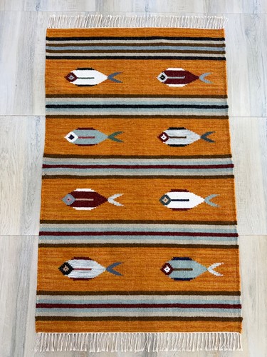 Hand woven wool area - hand,