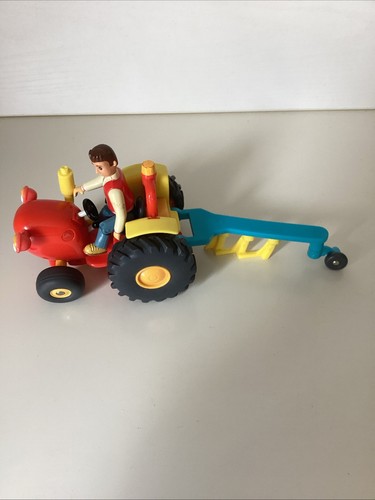 Tractor tom with plough - with, plough.