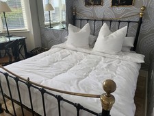 5ft black and brass bedstead
