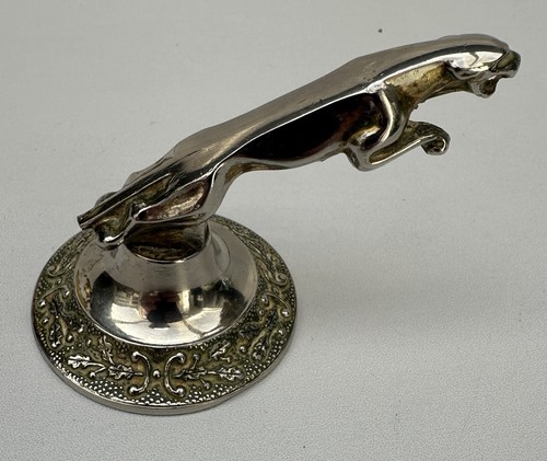 Metal chrome jaguar leaping - metal,