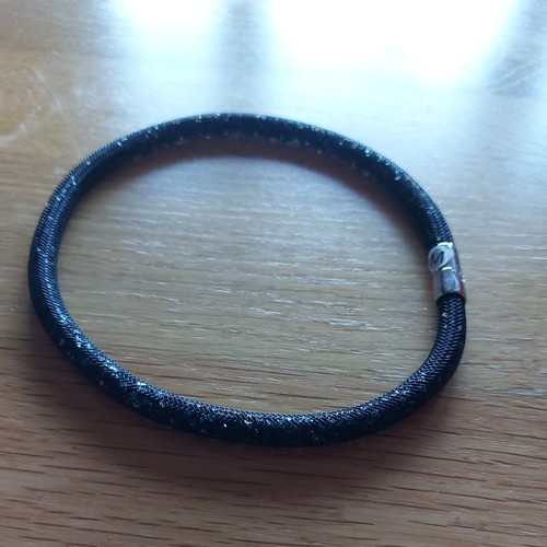 Swarovski black gold - &,