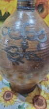 Vintage Stonewear Pottery Jug  with hand painted motif  made of clay. Mid 1800s