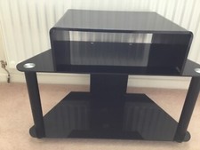 Black Acrylic tv table and riser fits up to 40 inch TV excellent condition 