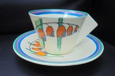 A Clarice Cliff conical cup & saucer in SOLOMON's SEAL pattern