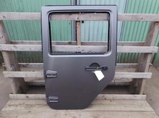 JEEP WRANGLER JK 4 DOOR LEFT NEAR SIDE REAR DOOR IN BLACK 2007 - 2018