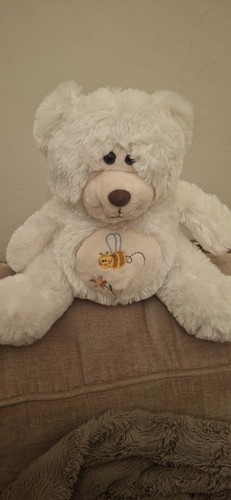Plush teddybear cuddles - teddybear.,