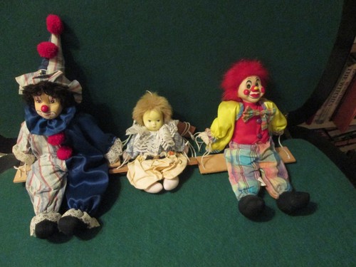 Three puppets two larger - three,
