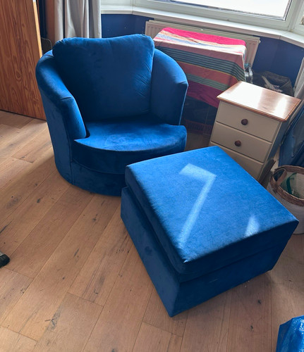 Blue upholstered swivel tub