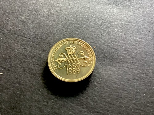 Old coin tercentenary of - £2,