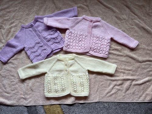 Hand knitted baby - hand,
