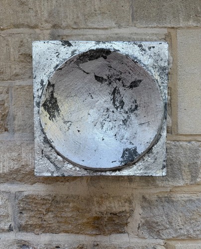 Wall sculpture with - , a