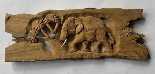 Hand carved wooden baby calf - hand,