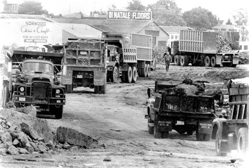Trucks dump land - , fill