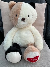 Brown/black/white cat plush