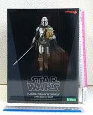 Mandalorian grogu with - &,