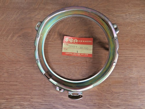 Suzuki nos headlight retainer - suzuki,
