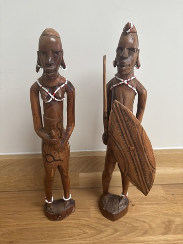 Carved wooden warrior statues - carved,