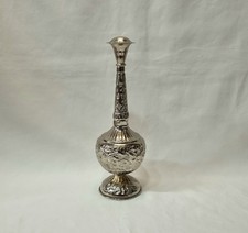 A vintage Middle Eastern two-piece silver plated brass rosewater sprinkler.