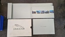 OLD "NEW JAGUAR OWNERS BOOK". SEE PHOTOS FOR ACTUAL ITEMS. 