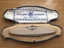 VINTAGE BOXED SINGLE STRAND LOTUS PEARL NECKLACE WITH SILVER MOUNTS