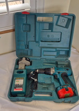 Makita 14.4V Cordless Combi Drill with 2 Batteries, Charger, and Case