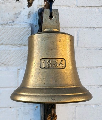 Bronze ship bell featuring - ship's,