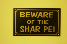BEWARE OF THE SHAR PEI sign or
