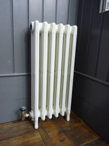 Old vintage cast iron radiator