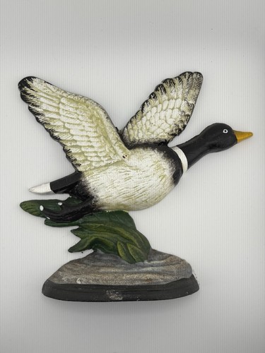 Vintage cast iron flying - cast,
