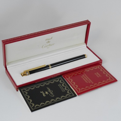 Cartier must black - must,