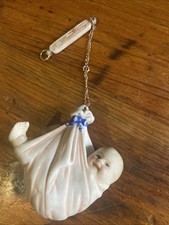 German Porcelain Bisque Swinger-Baby Cradled In Delivery Blanket