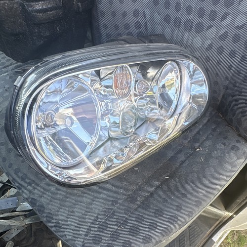 Golf drivers side headlight - side,