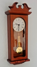 Windsor quartz wooden Westminster Chime wall clock with long swinging pendulum.