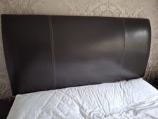 Curved, real hide, brown leather headboard. double