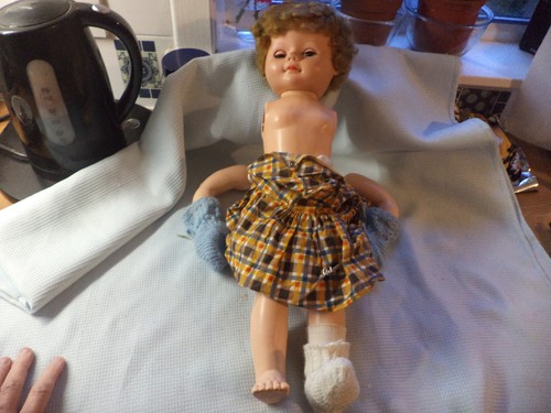 Large plastic doll with - ,