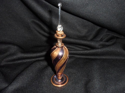 Perfume bottle purple gold - perfume,